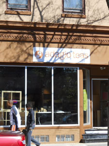 Temporary sign and new cornice